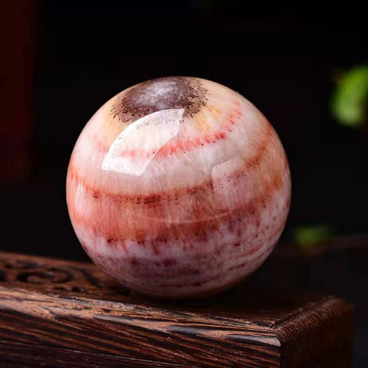 Rhodochrosite sphere-live