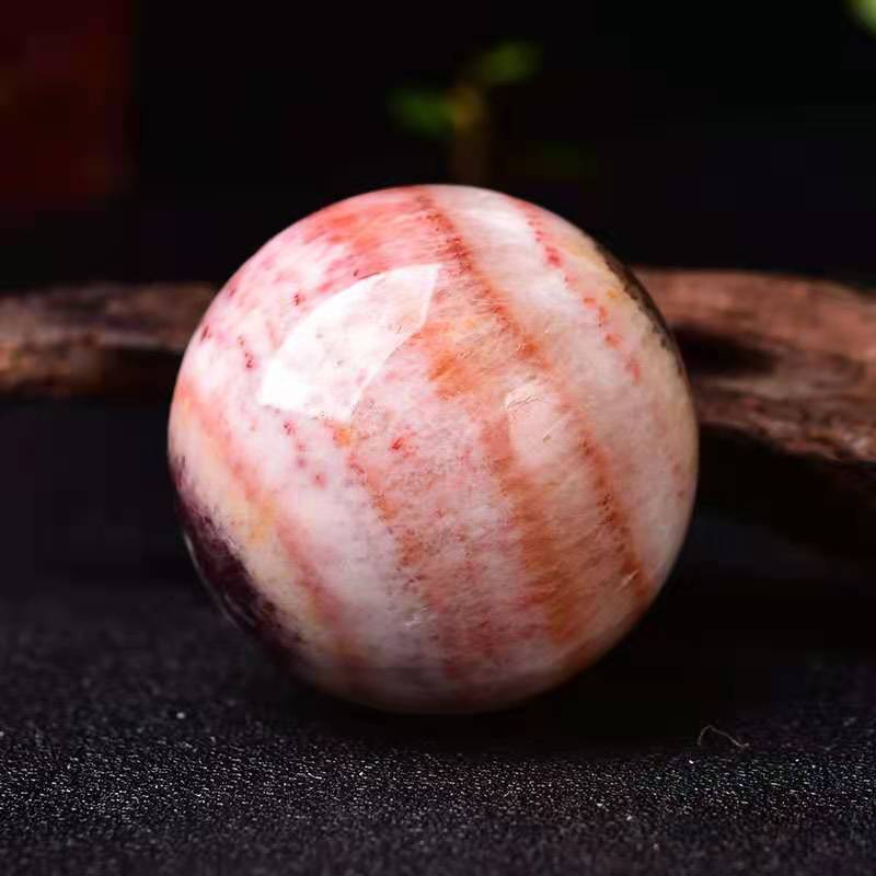 Rhodochrosite sphere-live
