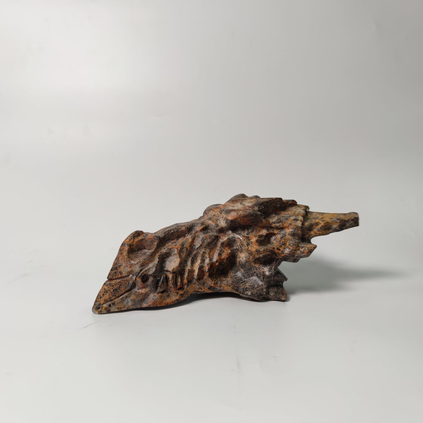 Brown calcite dragon head