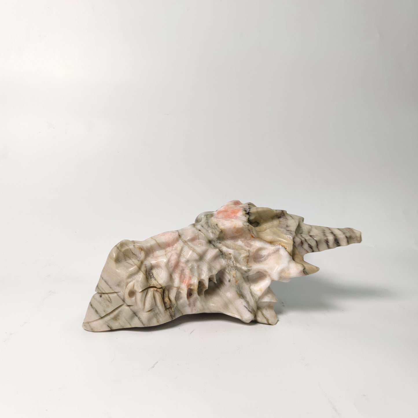 Orange calcite dragon head