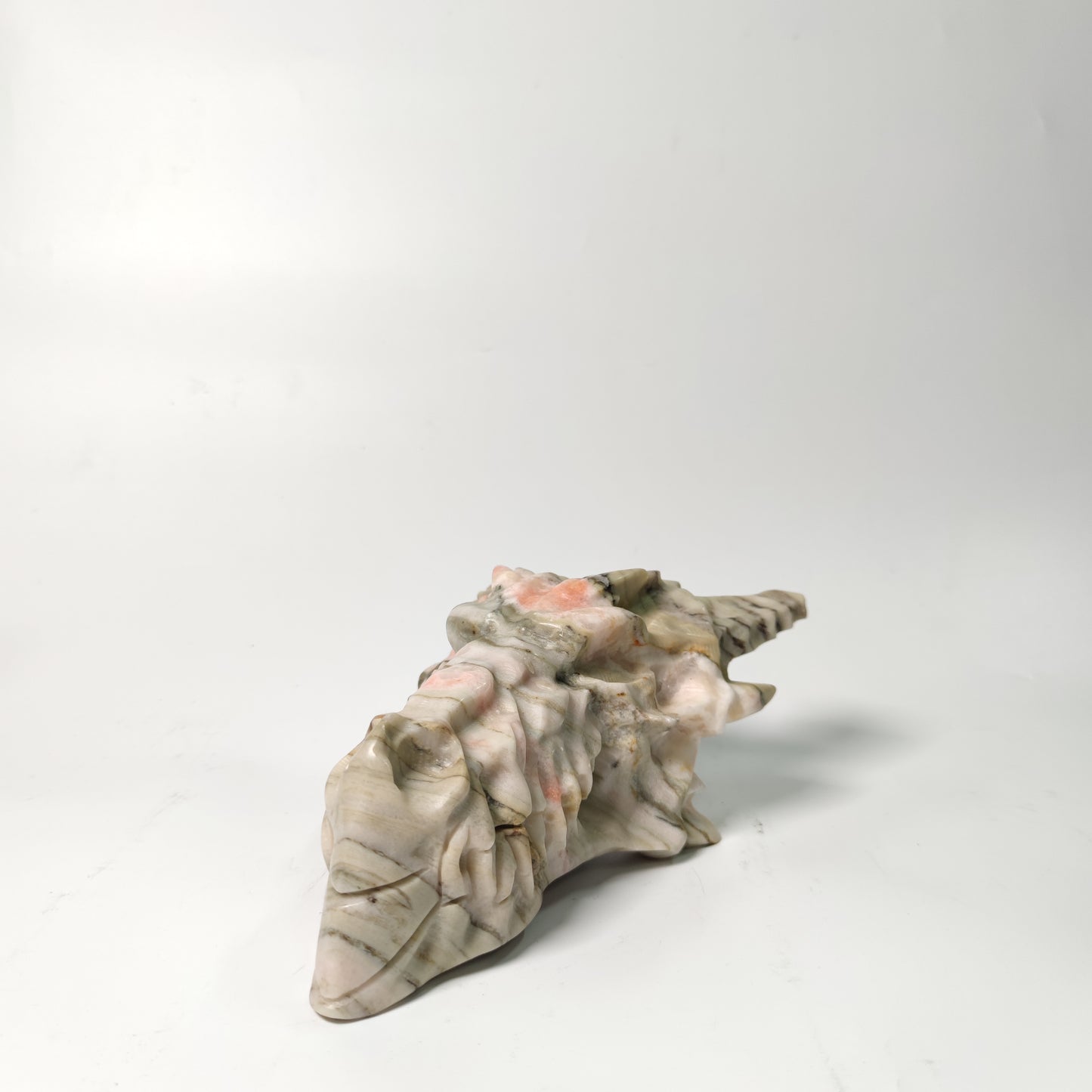 Orange calcite dragon head