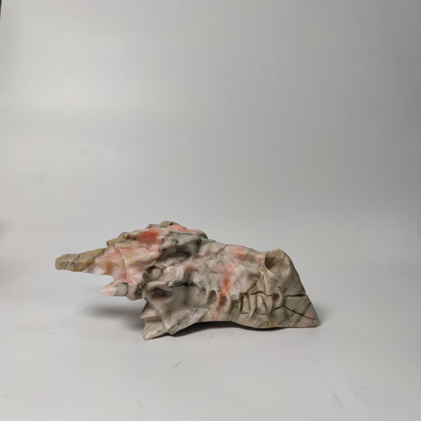 Orange calcite dragon head