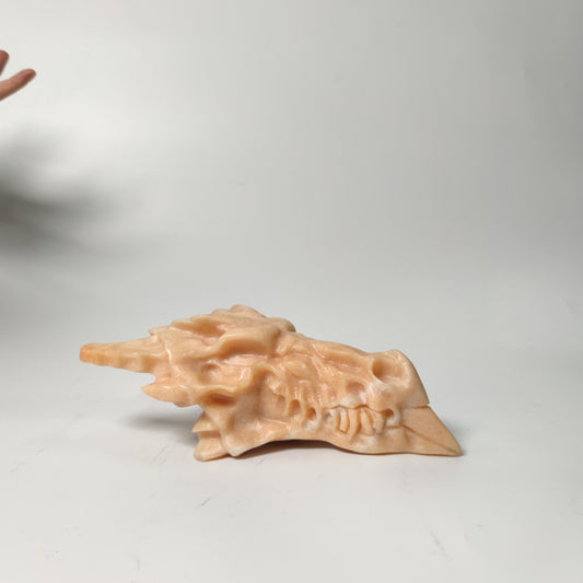 Orange calcite dragon head