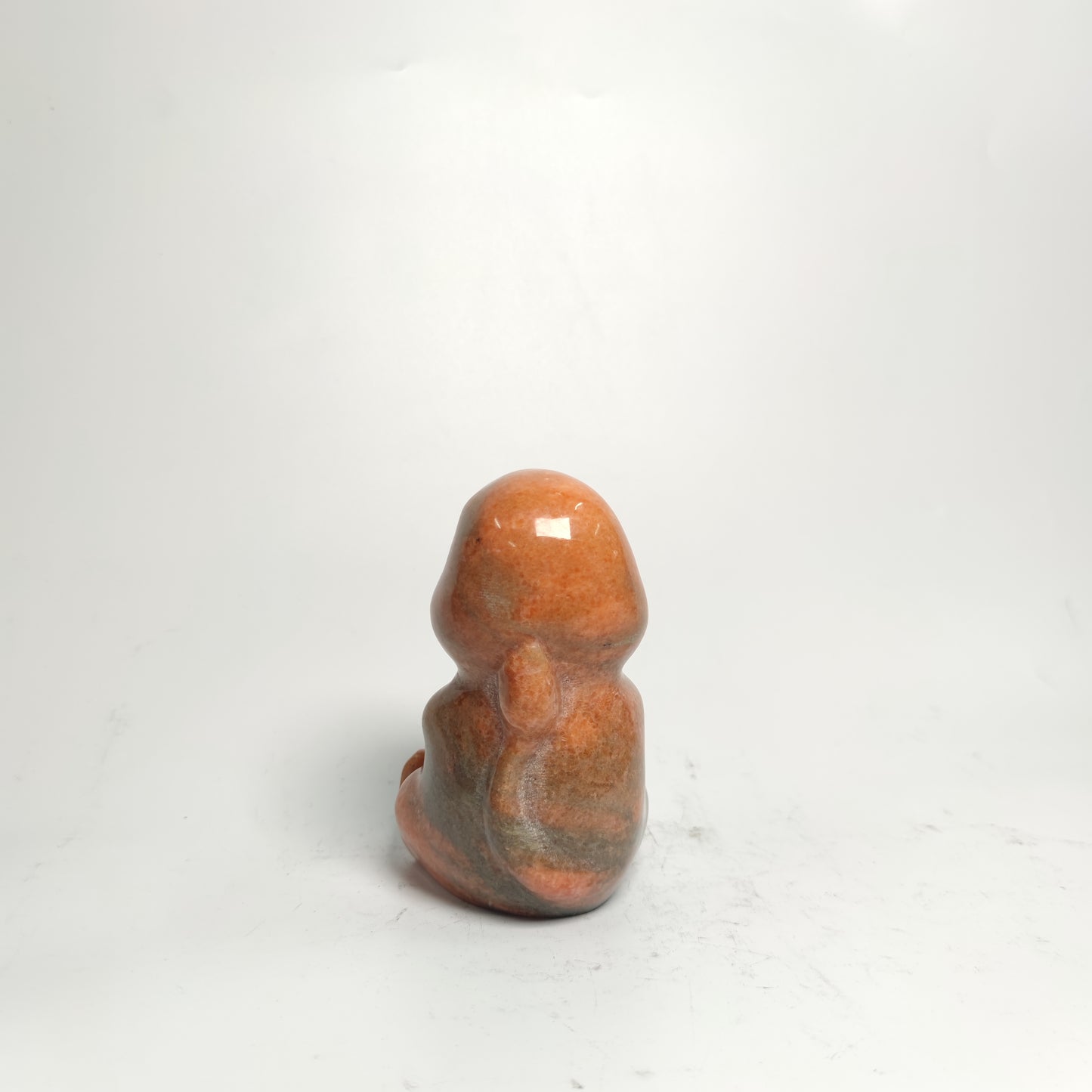 sunset red stone Pokemon carving