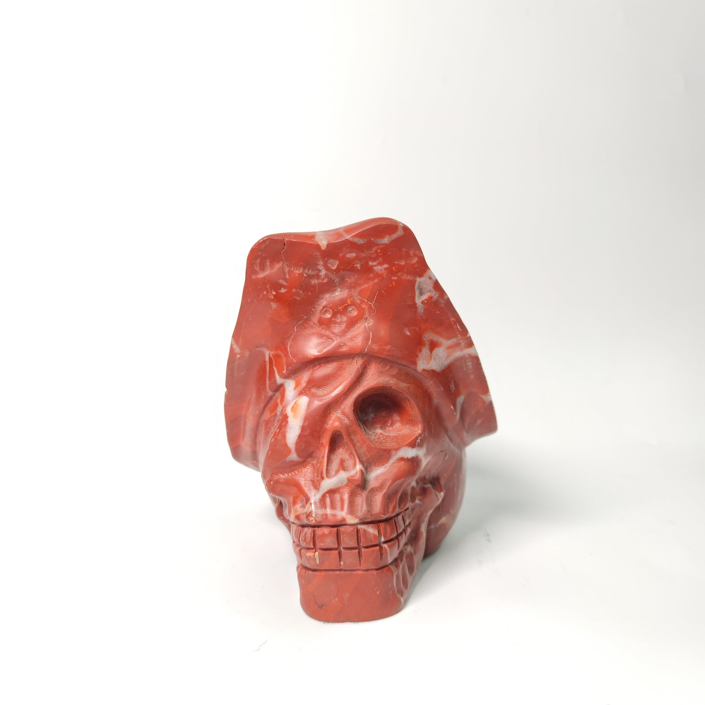 Red calcite skull