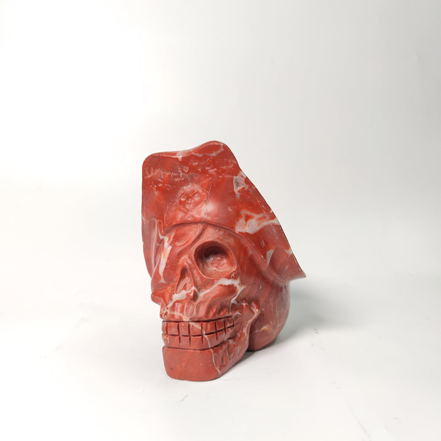 Red calcite skull