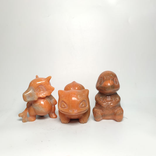 sunset red stone Pokemon carving